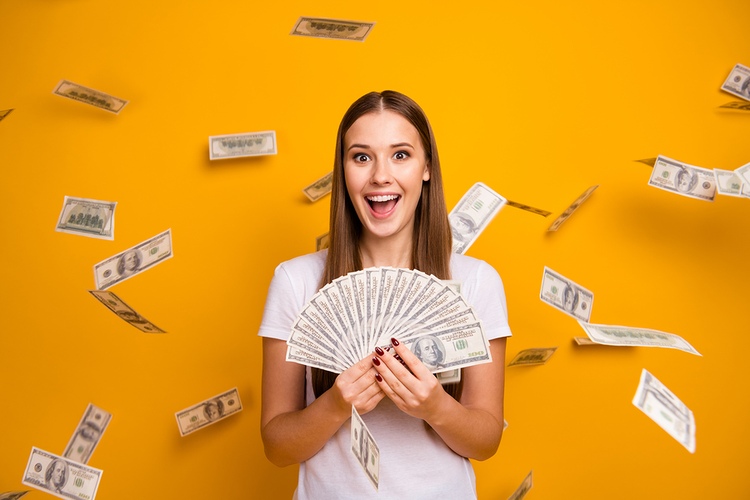 Smiling Girl Winning Money