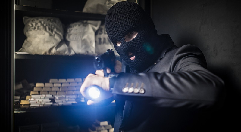 man robbing vault heist casino crime