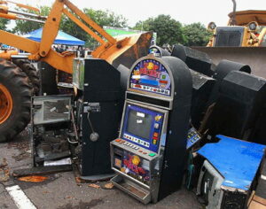 slot machines being destroyed